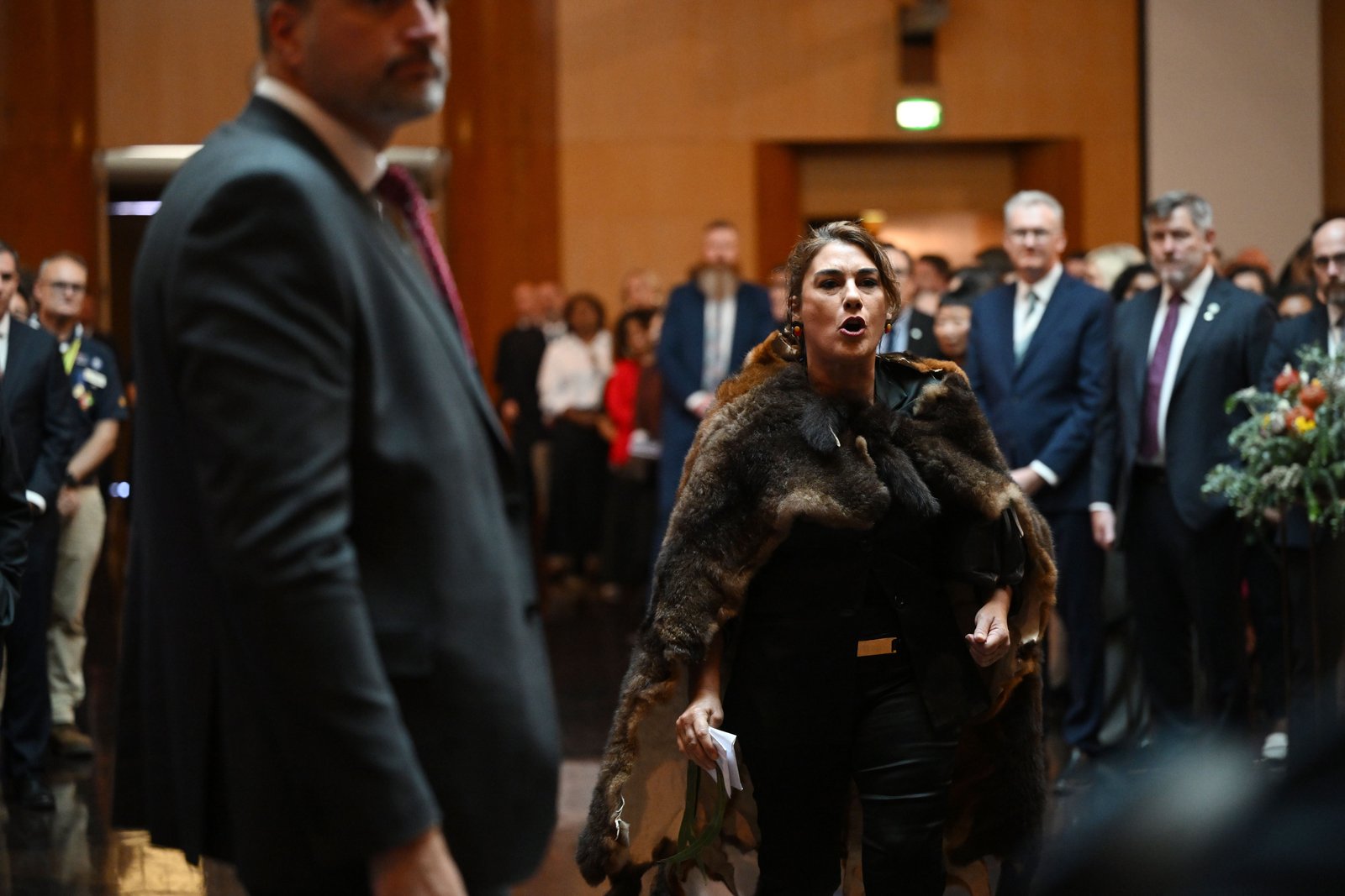 Australian Senator Lidia Thorpe protests during the ceremonial welcome to Australia for Charles and Camilla at the Australian Parliament House in Canberra (Victoria Jones/PA)