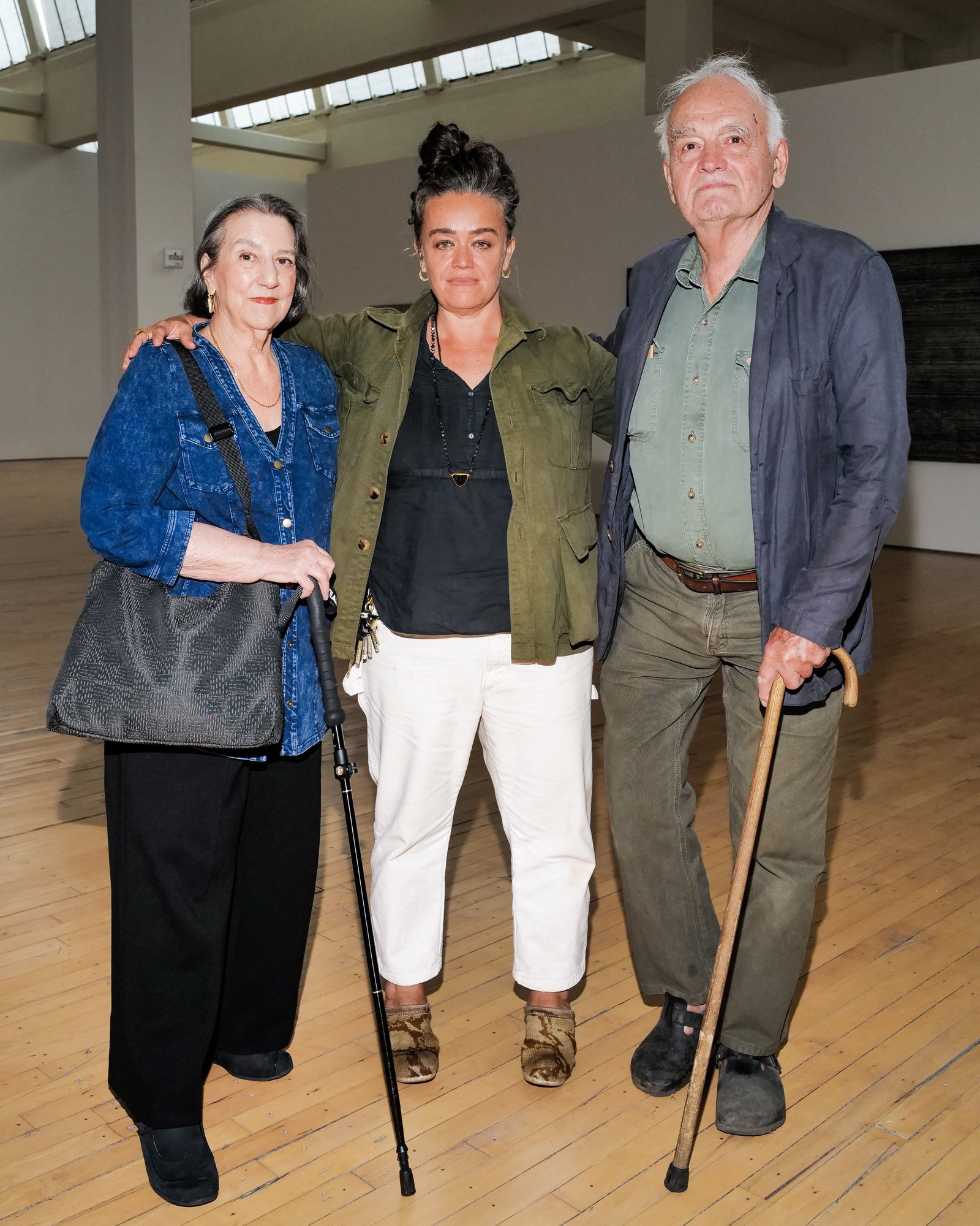 Maggie Trakas, pictured center, with her father George Trakas, the sculptor, right, at a 2023 art event in New York