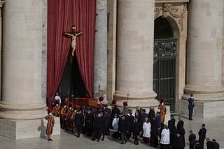 Pope Franci's body is passed through St. Peters Square to St. Peter's Basilica by the Vatican