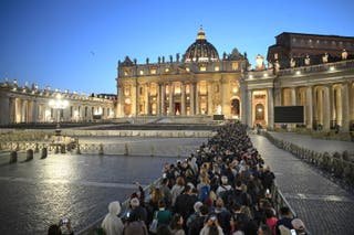 Members of the public line up to pay their respect to the late Pope Francis as he lies in the state inside of Saint Peter's Basilica, Vatican State April 23, 2025
