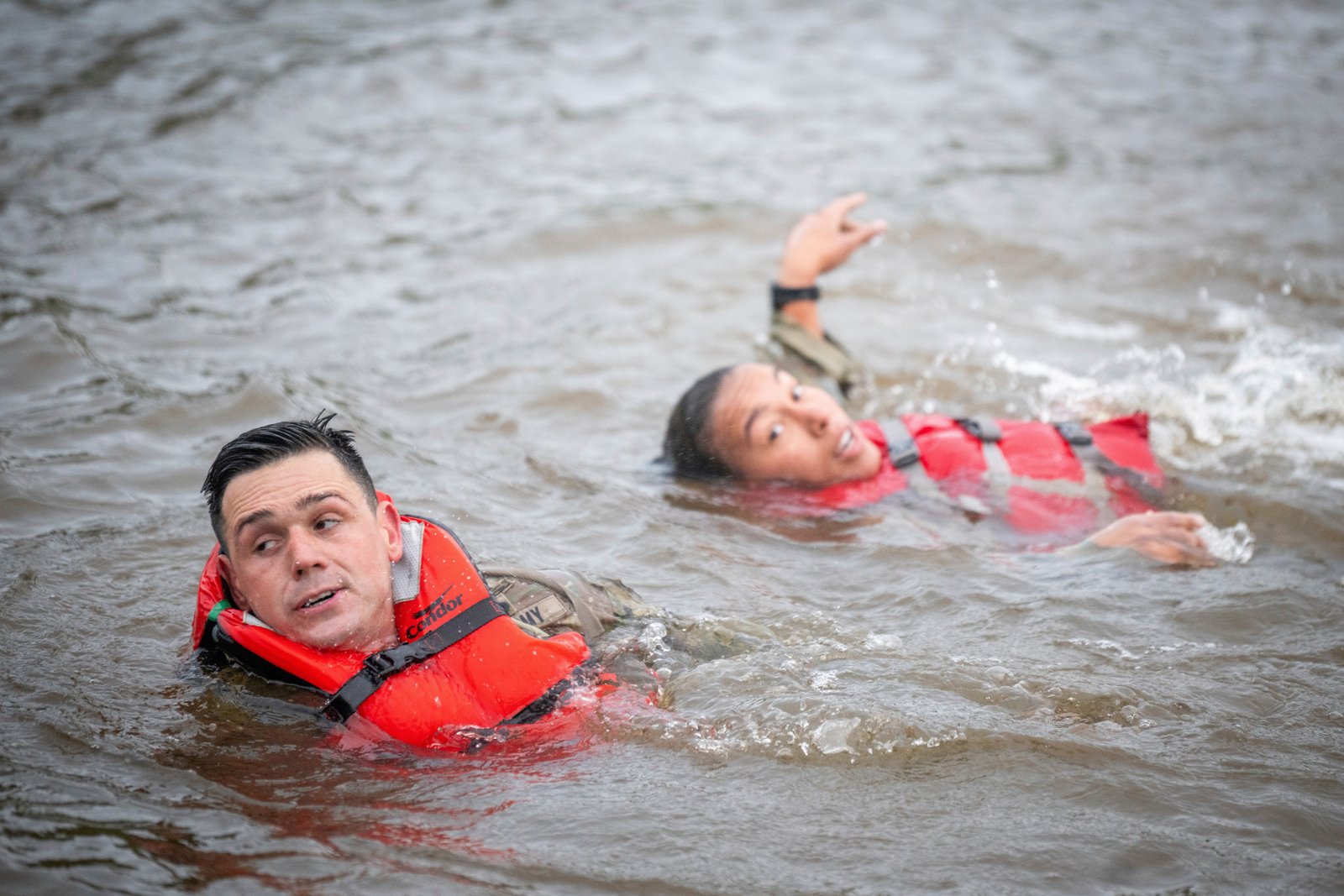 This image provided by the US Army shows Captain Seth Deltenre, Left and 1st. Gabrielle White, from the Maneuver Center of Excellence in Fort Benning, GA. As they compete in