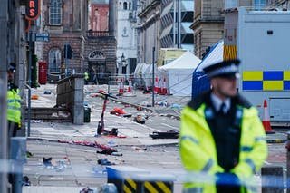 Police tents surrounded by garbage on stage in Water Street near the Liver building in Liverpool City Center Tuesday Morning