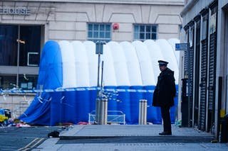 An inflatable field tent on stage in Water Street Tuesday Morning