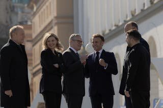 (From L) Poland's Prime Minister Donald Tusk, Olena Zelenska, Britain's Prime Minister Keir Stormer, France's President Emmanuel Macron, Ukraine's President Volodymyr Zelensky and Germany's Chancellor Friedrich Merz visit the Square Square (Maidan) in Kyiv