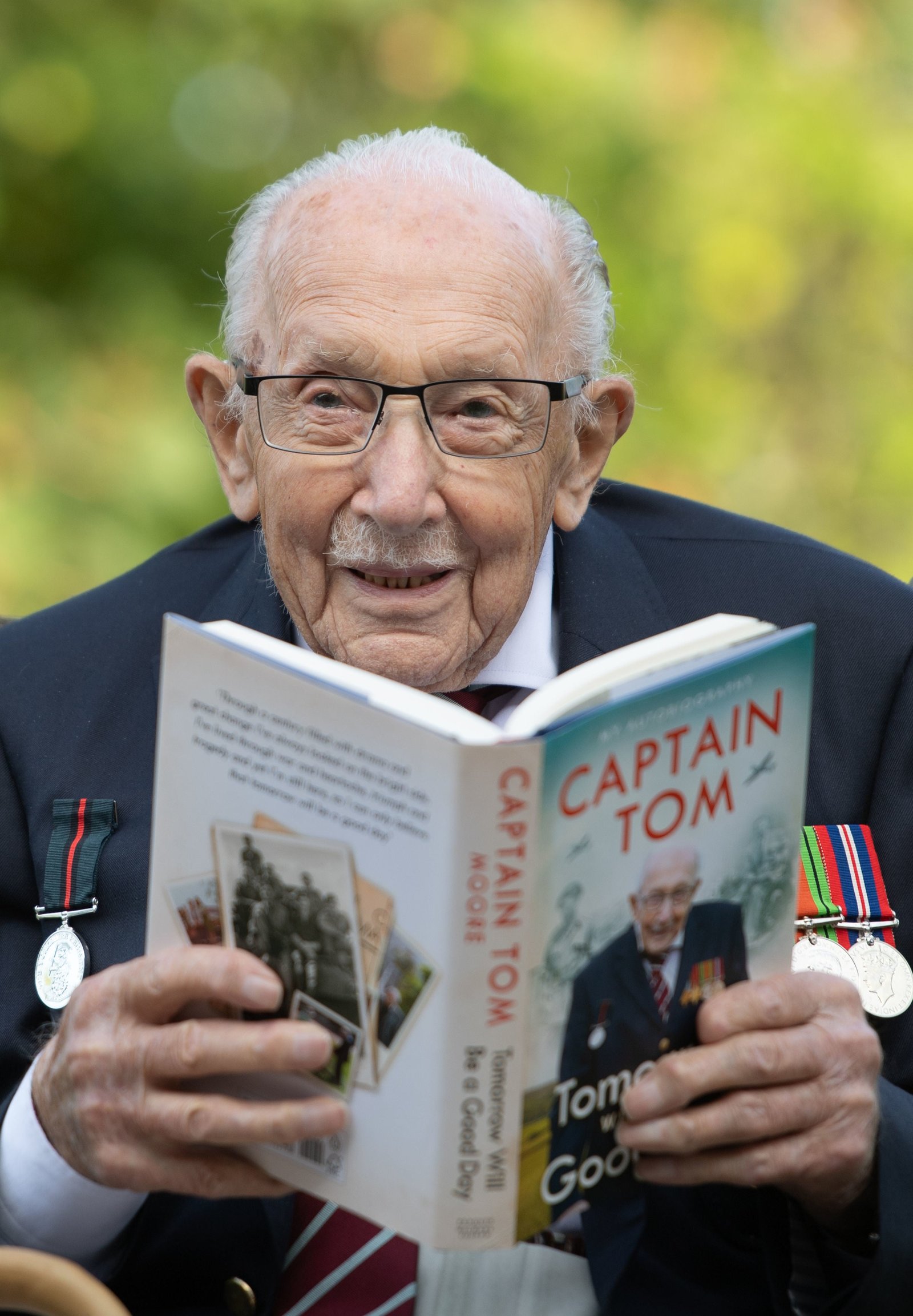 Captain Sir Tom Moore with his book tomorrow will be a nice day