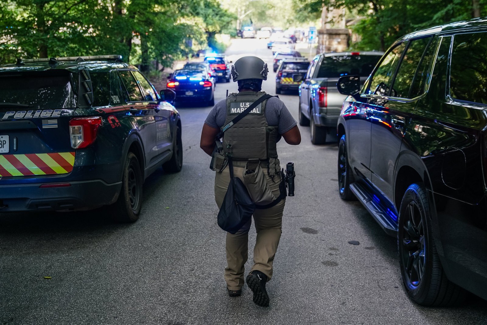 A spokesman for CVS said no one inside the Emory Point store was wounded in the shooting