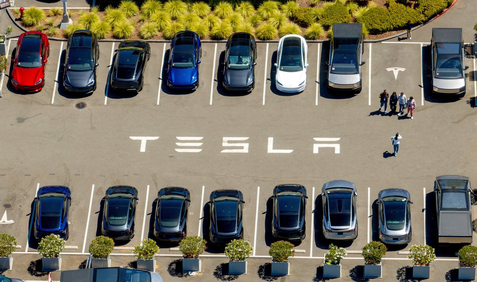 Tesla had record sales in its third quarter as consumers raced to take advantage of an expiring tax credit