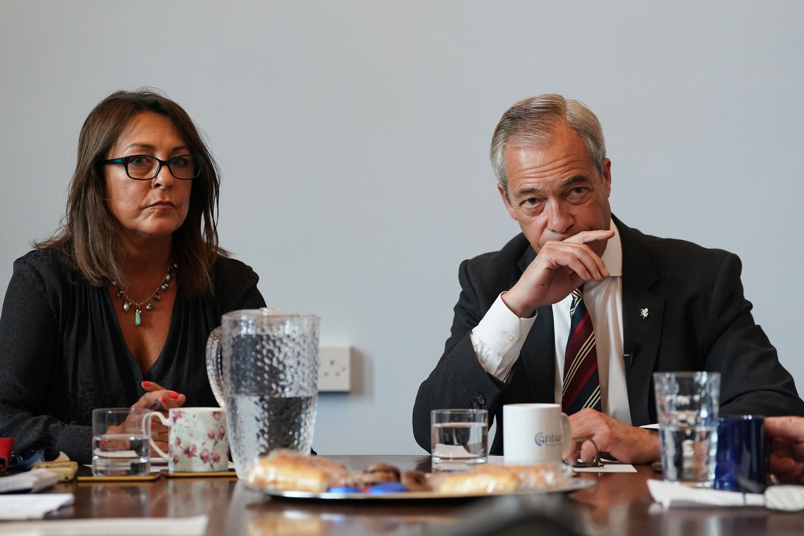 Reform UK -Leader Nigel Farage attends a meeting with the head of Kent County Council, Linden Kemkaran, in July (Pa)
